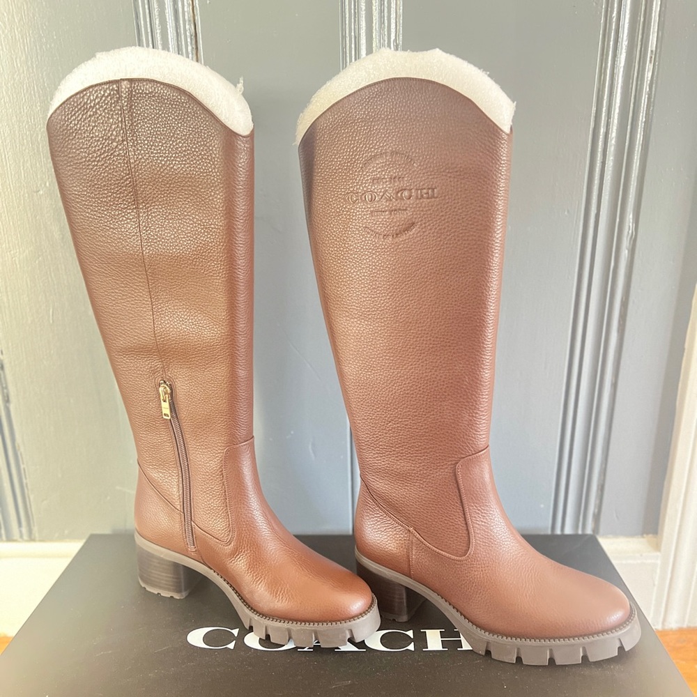 Brand new Coach boots never worn.